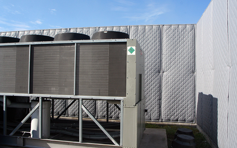 Acoustic enclosures and blankets reduce disruptive chiller noise.